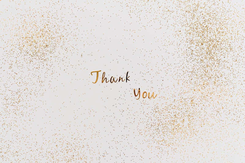 Gold Thank You Text with Gold Glitters