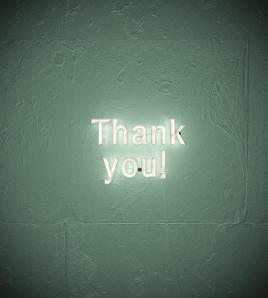 Thank You neon sign on wall