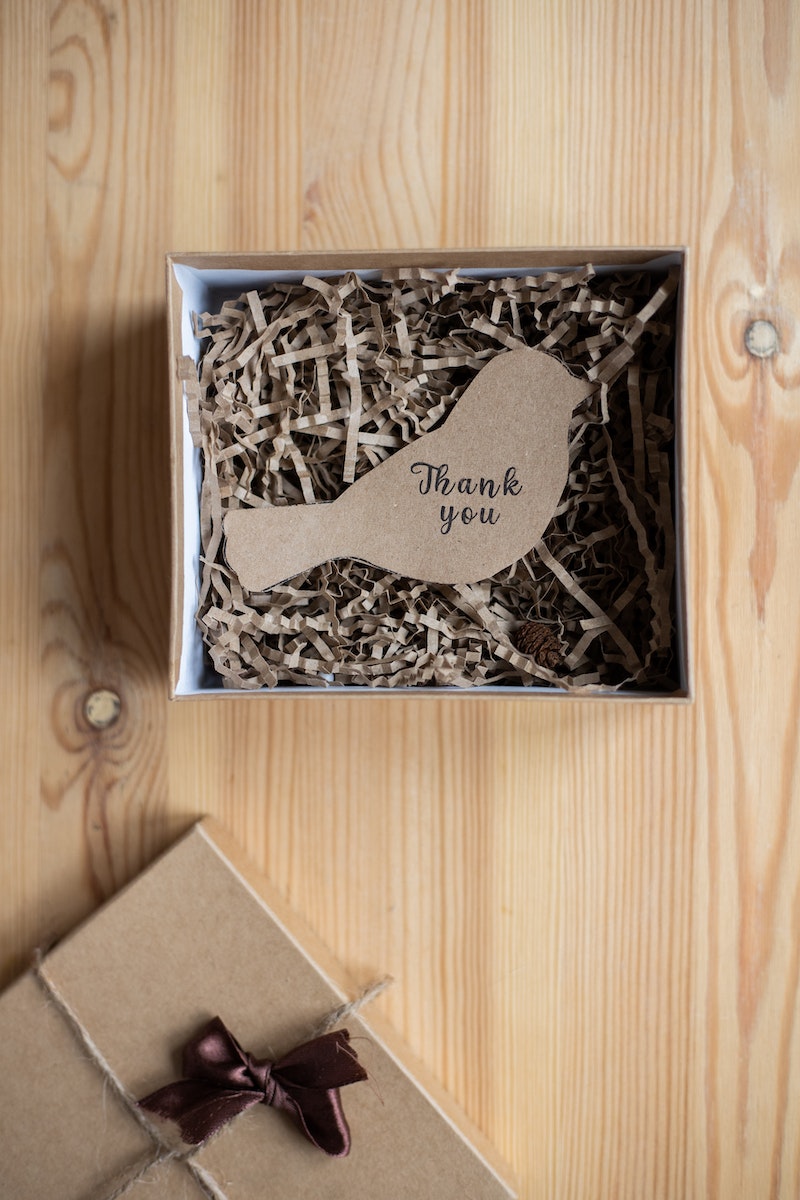 Thank you postcard in shape of bird in gift box